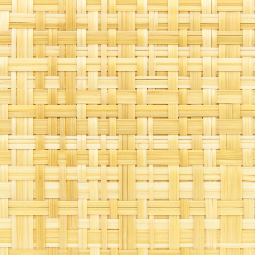 Bamboo cane webbing in open hexagonal weave, pale yellow tone